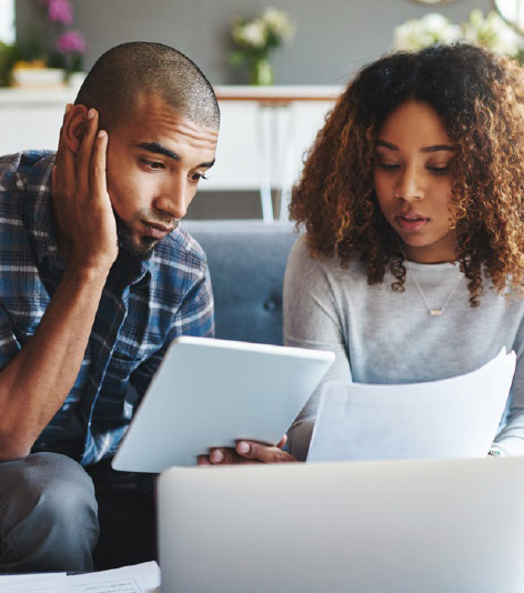 image of a couple looking at documents