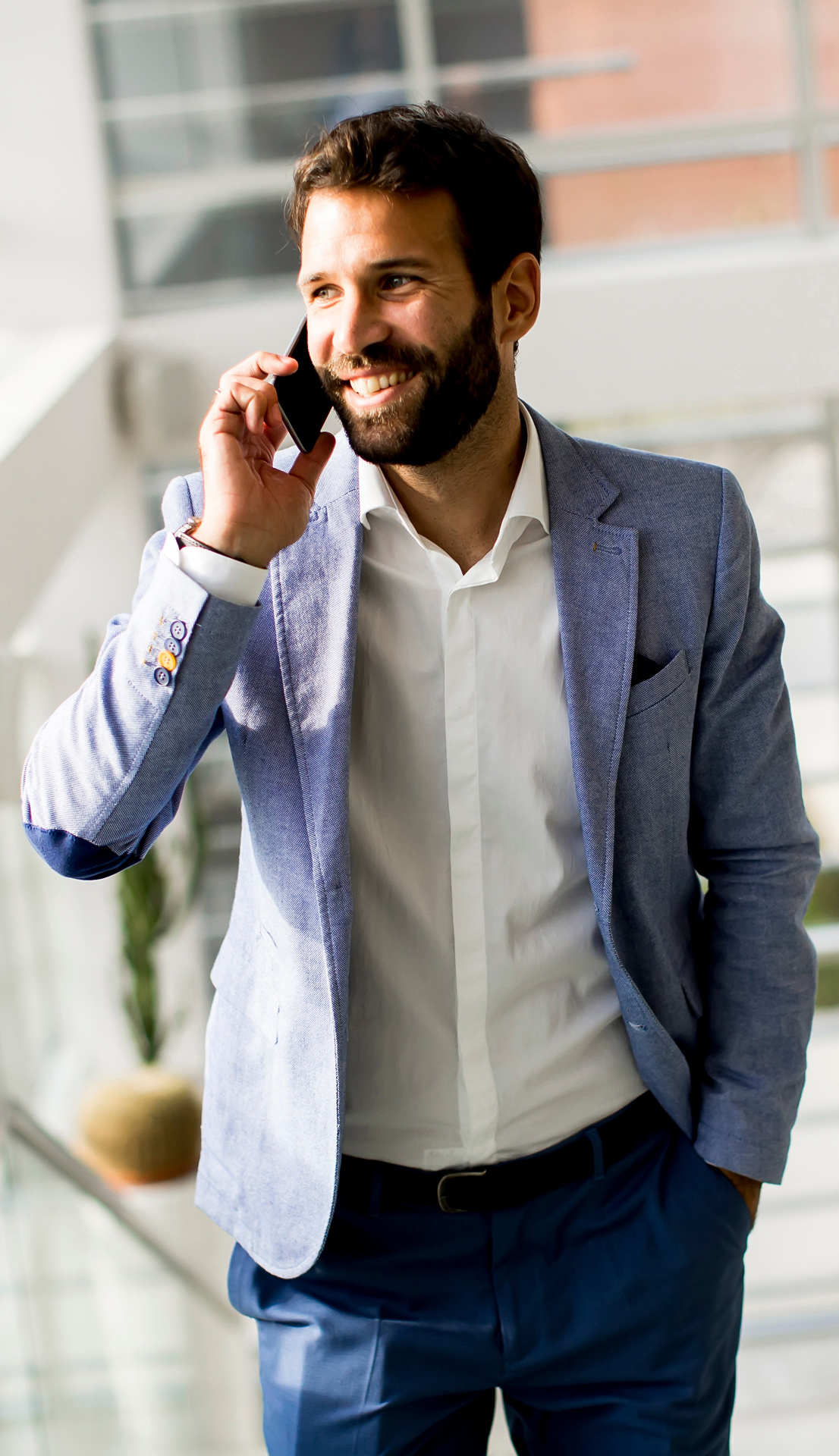 Bearded man on phone